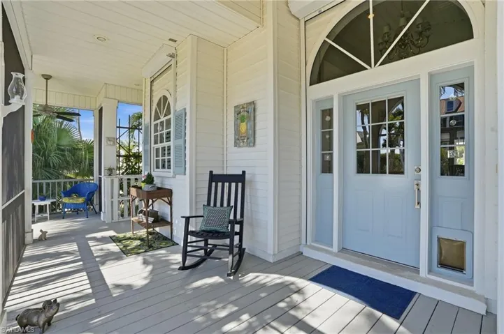 Property entrance featuring covered porch