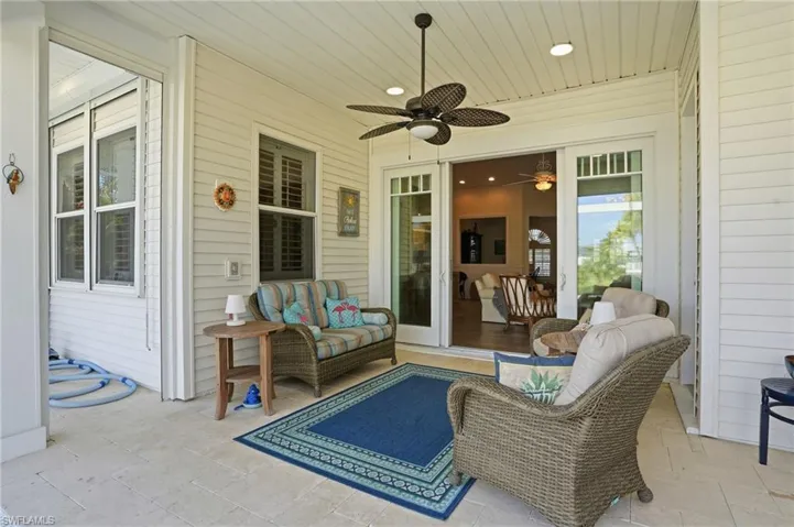 View of patio featuring ceiling fan