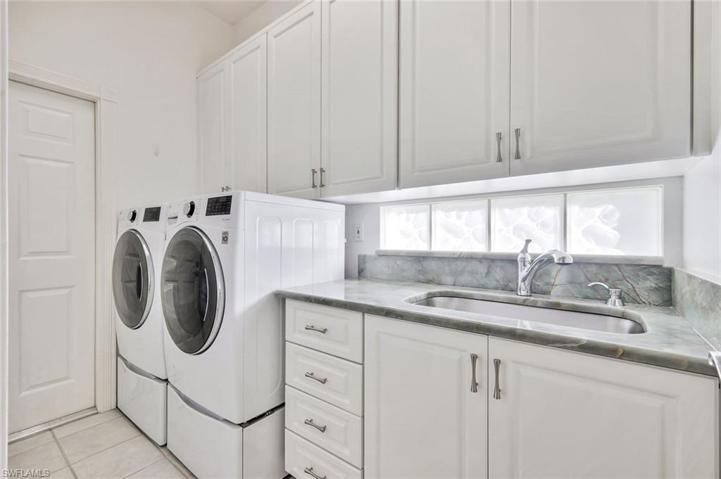 Laundry with raised Dryer & Washer