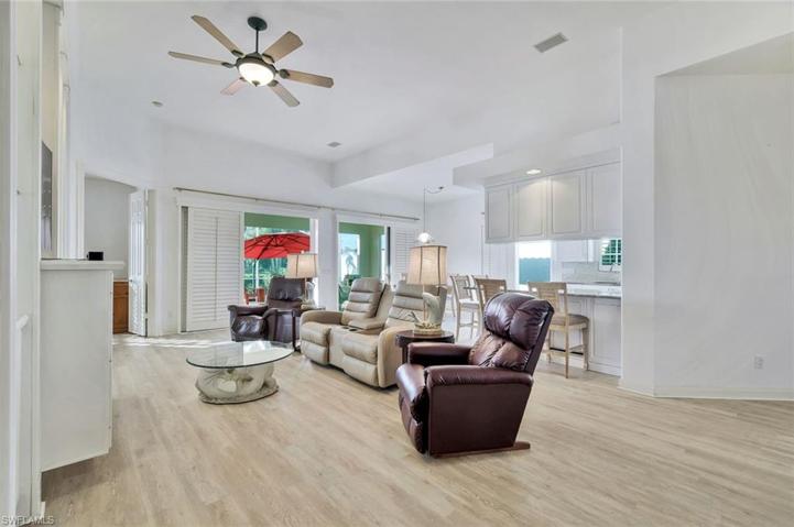 Maing living area with 12 foot ceilings