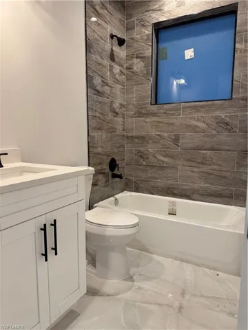 Full bath with vanity and  shower combination