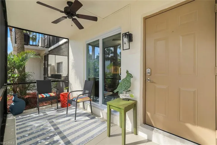 Front Lanai with ceiling fan and a patio area