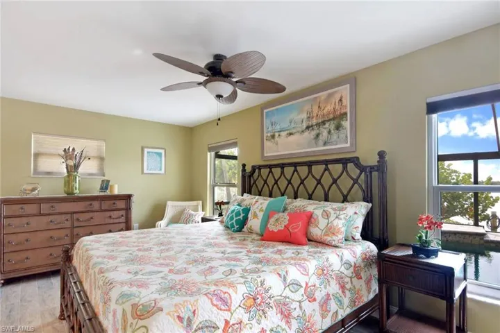 Bedroom featuring light wood-type floors and ceiling fan