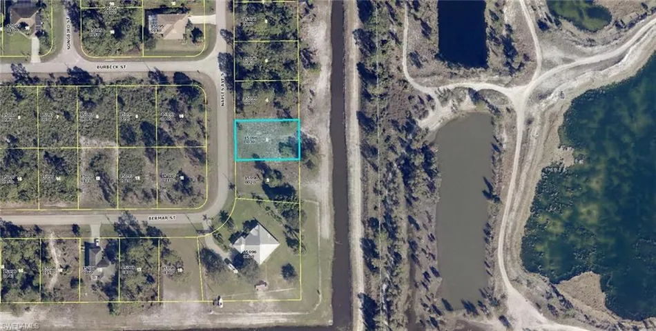 Aerial overview of property's location with property parcel outlined