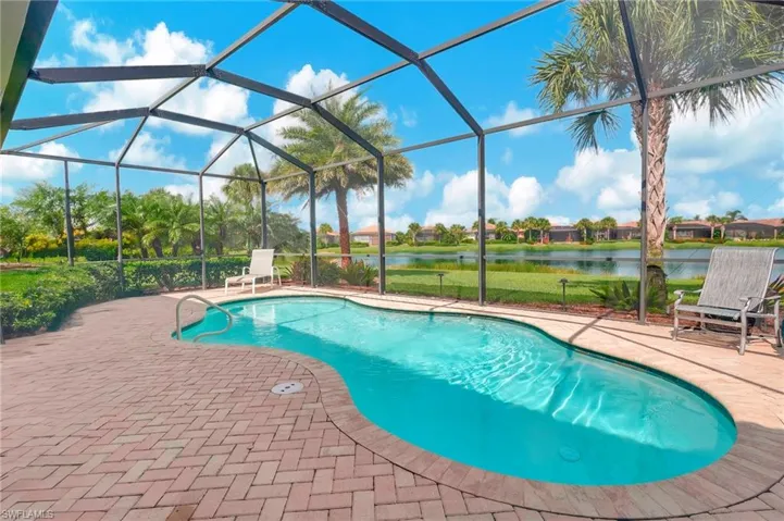 View of pool with screen enclosure