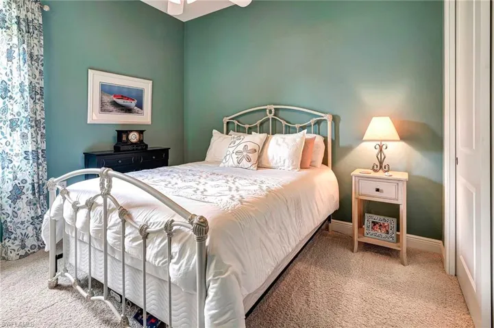 Bedroom featuring carpet floors