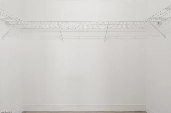 View of spacious walk-in closet
