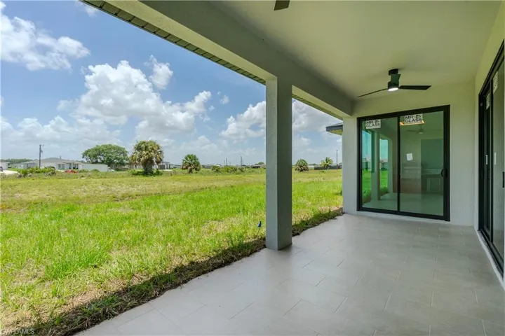 View of patio / terrace featuring a ceiling fan