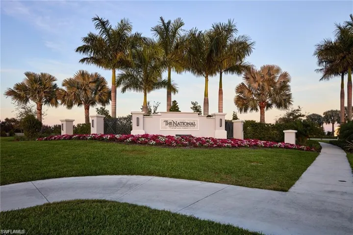 Community sign featuring a lawn