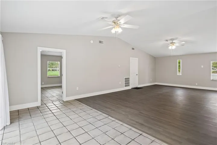 This open living and dining area feels bright, welcoming, and inviting.