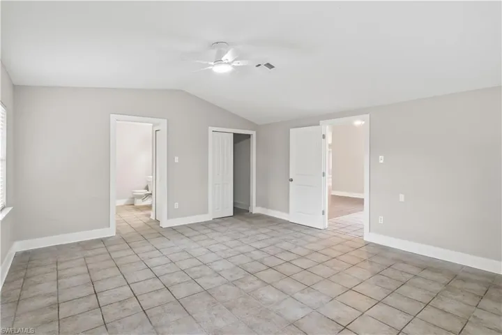 Relax in the spacious primary suite, a true retreat with privacy, natural light, and room to unwind after a long day.
