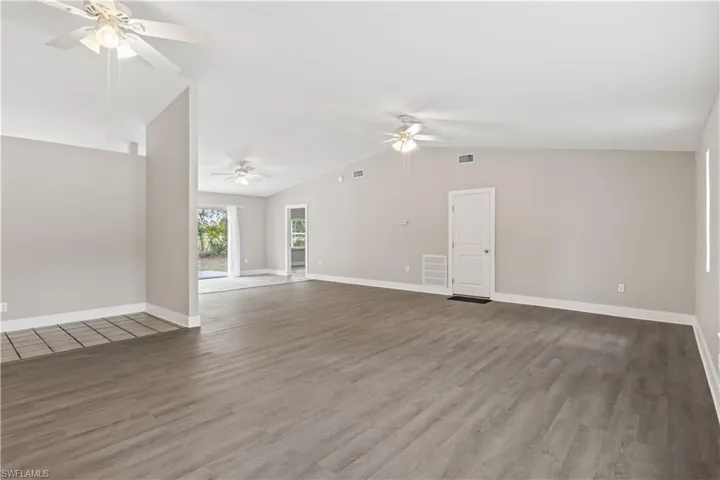 Natural light pours in, highlighting the open layout and relaxed island vibe.
