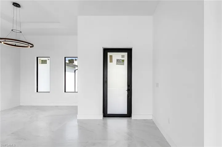 Spare room with baseboards