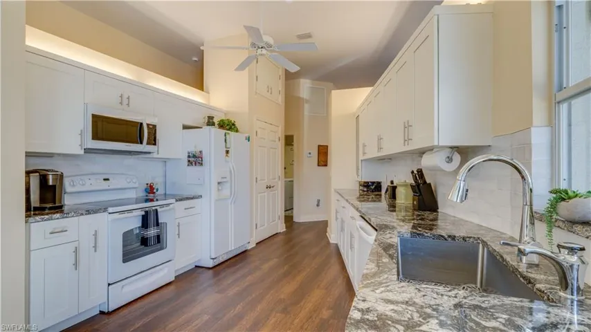 Kitchen with wood cabinets and large pantry
