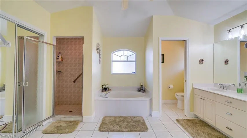 Primary bathroom with soaker tub and separate shower