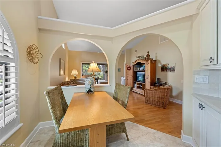 Dining area featuring light tile patterned flooring
