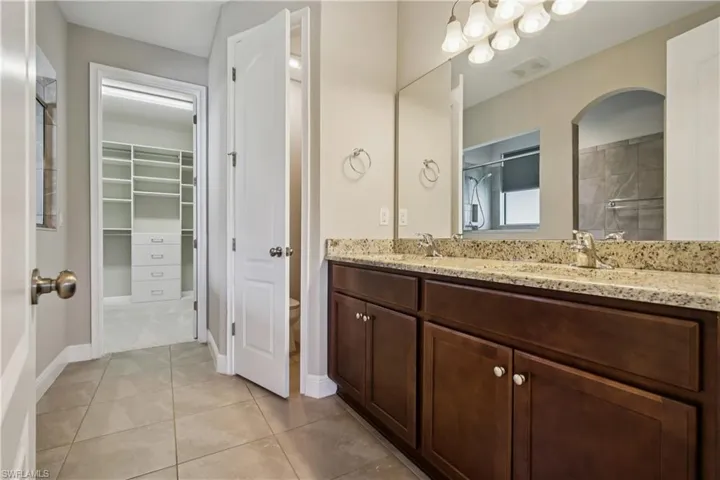 Primary bathroom with Huge walk-in shower & dual showerheads.