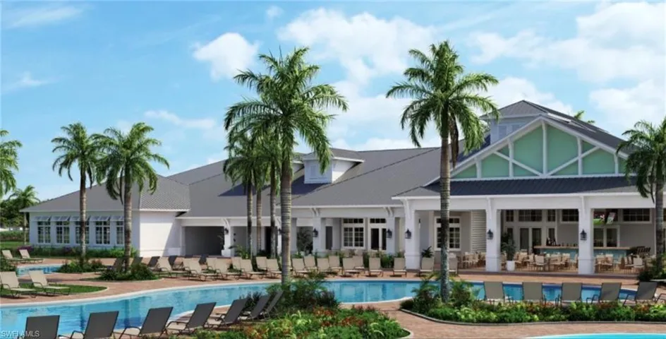 Back of property featuring a community pool and a patio