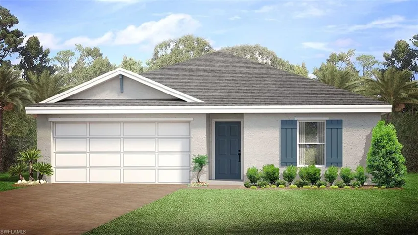Ranch-style home featuring a garage and a front lawn