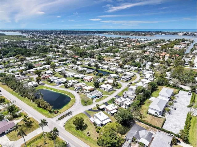 Bird's eye view featuring a water view and a residential view