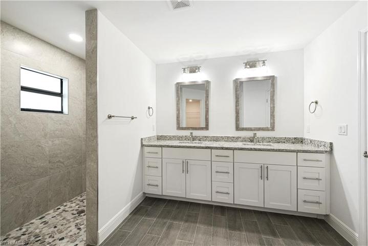 The Master Bathroom Has Granite Countertops, Brushed Nickel Fixtures, Custom Mirrors And Lights, And A Tiled Walk-In Shower!