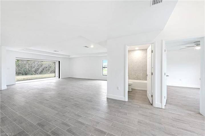 The Family Room/Dining Room Is Very Large And The View Out Of The Tripple Sliders Is Of A Wooded Preserve!