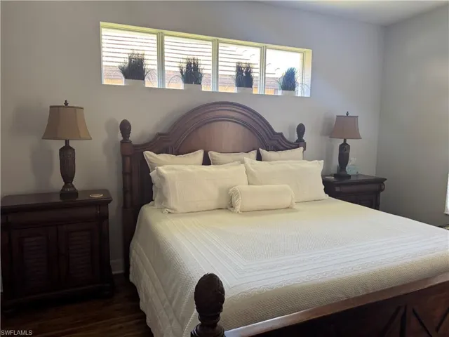 Bedroom featuring wood finished floors