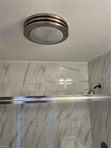 Bathroom view of tiled shower