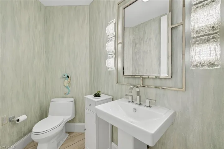 Bathroom featuring toilet and a sink