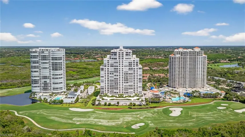 Aerial view of a nearby body of water and a golf club