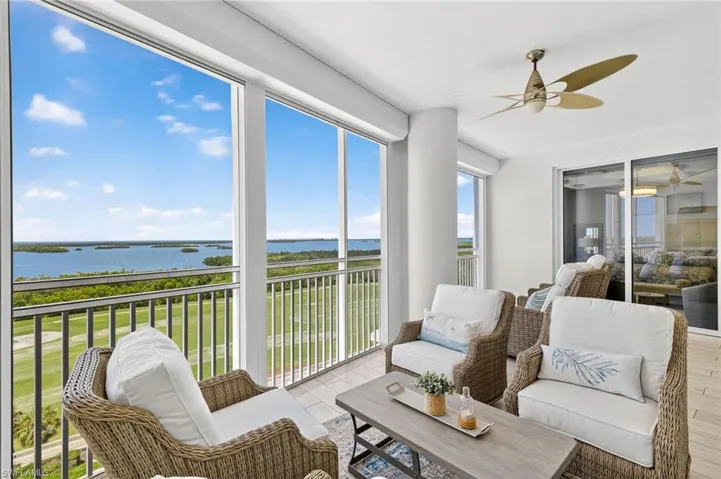 Sunroom with a water view