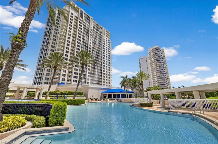 Community pool with a patio area