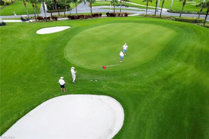 View of home's community with view of golf course