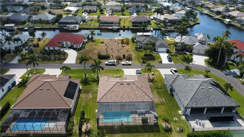 Aerial view of residential area with a large body of water