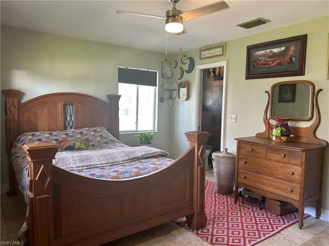 Large primary bedroom has bathroom and walk in closet.