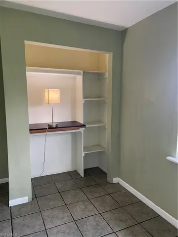 Guest  bedroom #3 located off of the office space, view of closet inside bedroom