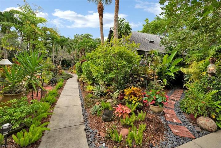 walking paths with tropical landscaping