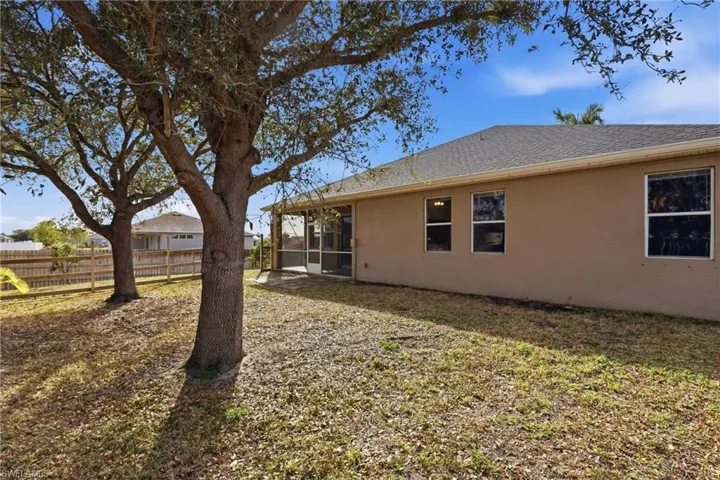 View of yard with a sunroom