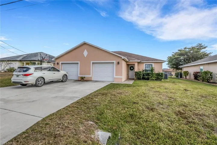 Duplex with each side offering 3 beds/2bath/1 car garage