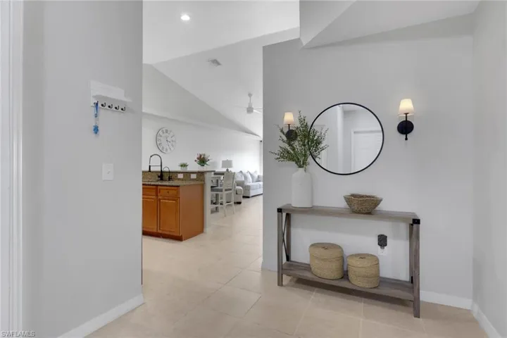 Bedroom featuring ceiling fan and baseboards