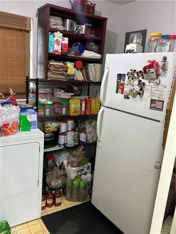 Storage area with washer / clothes dryer