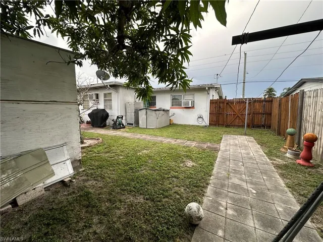 View of fenced backyard