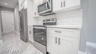 1057  Redbank  AVE, Lehigh Acres, FL 33974