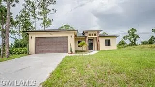 1057  Redbank  AVE, Lehigh Acres, FL 33974
