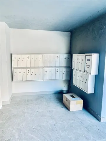 View of home's community featuring mail area