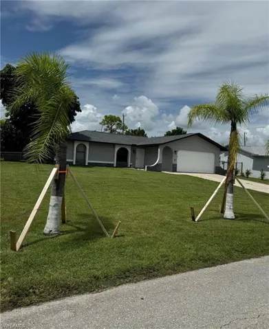 Ranch-style house with a garage
