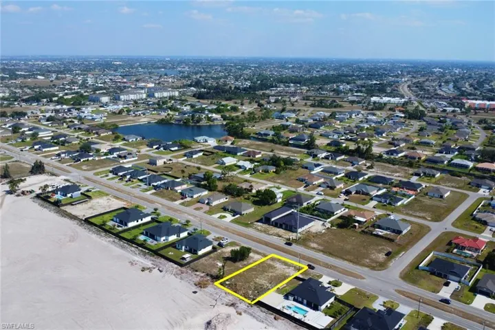 Birds eye view of property with a residential view