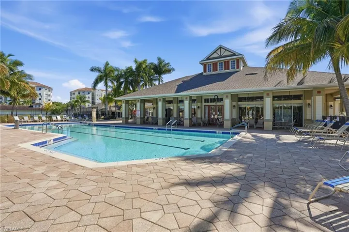 Community pool featuring a patio area