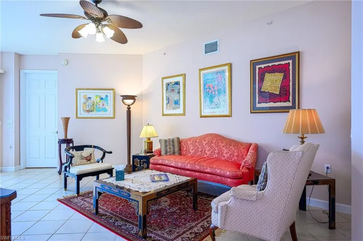 Tiled living room with ceiling fan