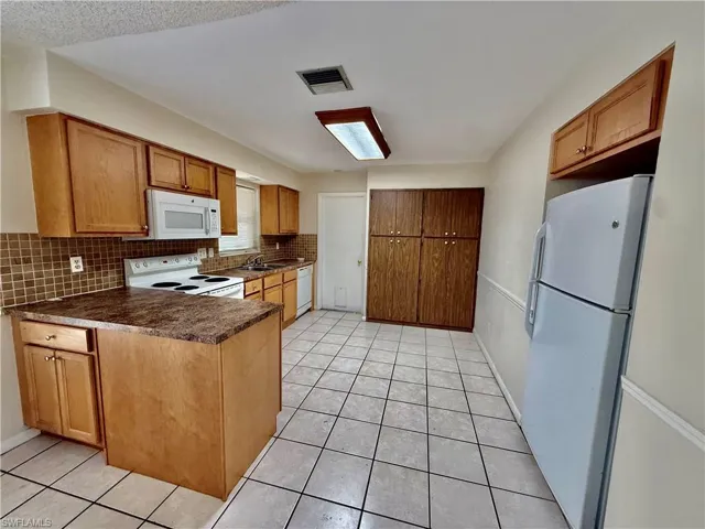 706 E 3rd St, Lehigh Acres, Florida 33936